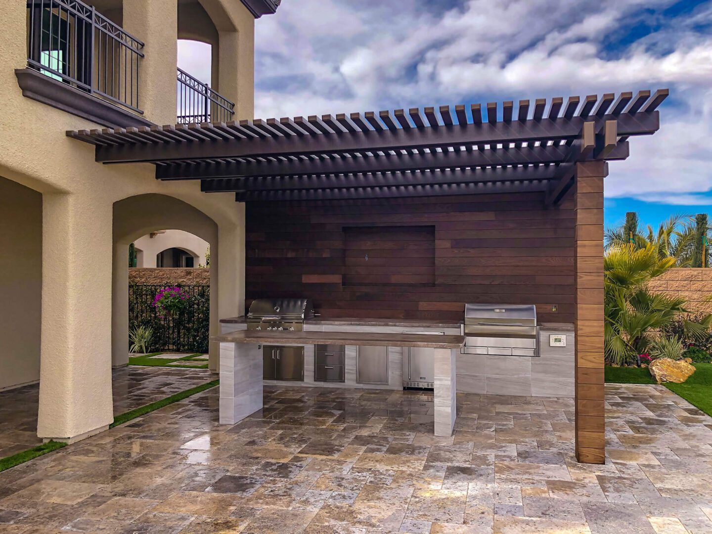 Custom Outdoor Kitchen with Wood Slat Patio Cover Design