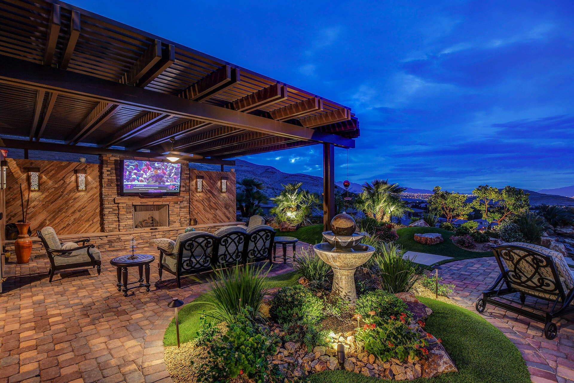 Gorgeous Soft Arch Wood Patio Cover by Custom Outdoor Living of Southern Nevada - with Media Wall